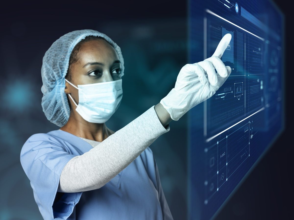 Doctor touching modern virtual screen interface medical technology