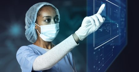 Doctor touching modern virtual screen interface medical technology